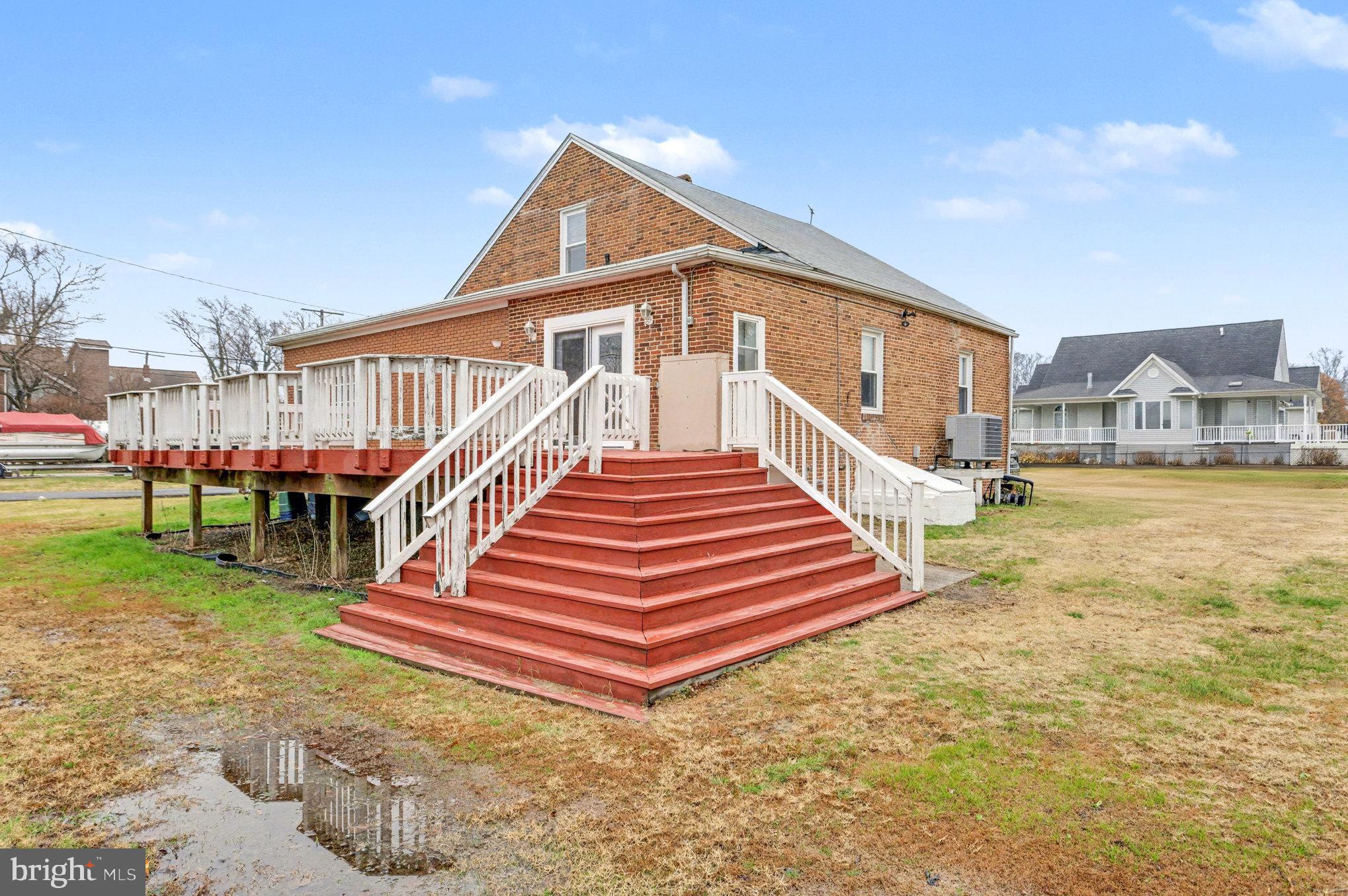 2810 & 2810-a 12th Street Baltimore, MD 21219 - Photo 45 of 67 a front view of a house with a yard