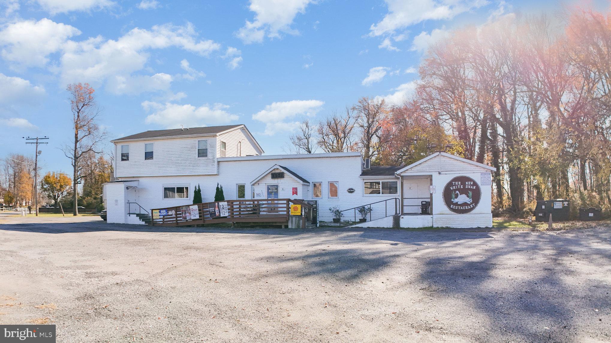 2810 & 2810-a 12th Street Baltimore, MD 21219 - Photo 63 of 67 a front view of a house with a yard covered in snow