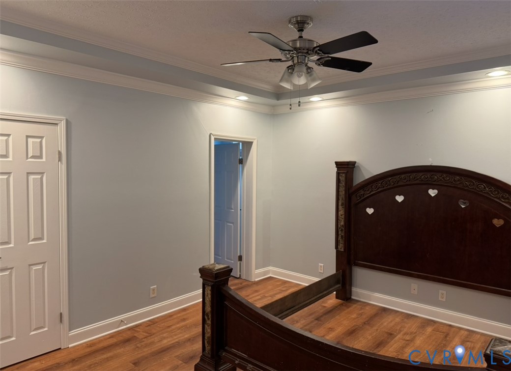 12232 Cedar Lane Ashland, VA 23005 - Photo 14 of 18 a living room with hardwood floor and a ceiling fan