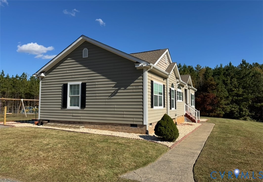 12232 Cedar Lane Ashland, VA 23005 - Photo 3 of 18 a view of house with yard