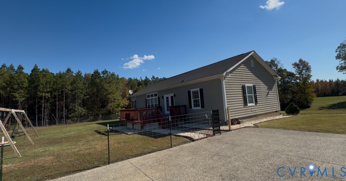 12232 Cedar Lane Ashland, VA 23005 - Photo 5 of 18 a view of house with outdoor space