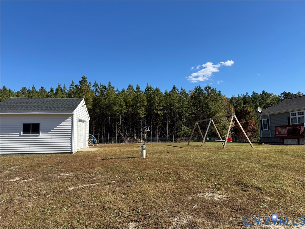 12232 Cedar Lane Ashland, VA 23005 - Photo 9 of 18 a view of outdoor space with playground and green space