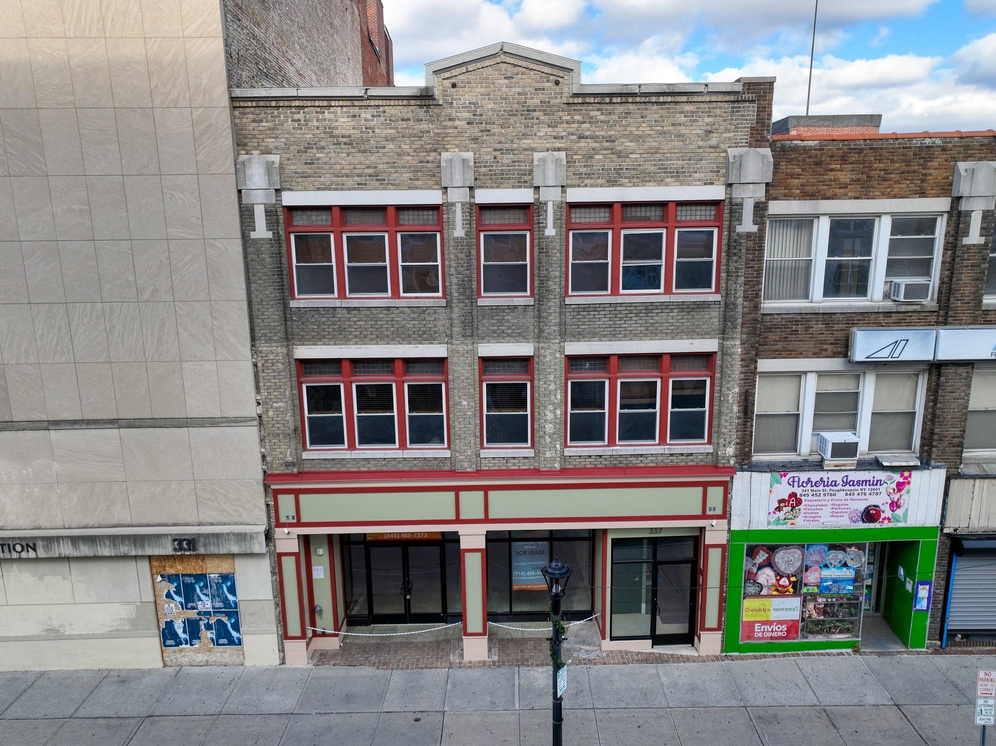 337 Main Street Poughkeepsie, NY 12601 - Photo 1 of 1 View of building exterior featuring cooling unit