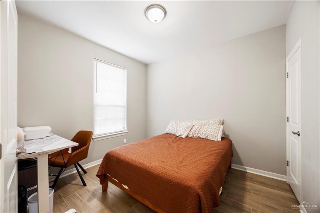 6332 Cascada Bnd Road McAllen, TX 78504 - Photo 11 of 18 a bedroom with a bed and a window