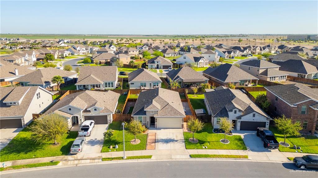 6332 Cascada Bnd Road McAllen, TX 78504 - Photo 15 of 18 an aerial view of multiple houses with yard
