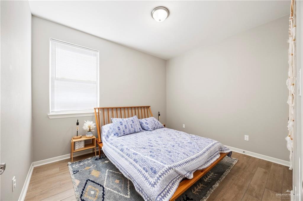 6332 Cascada Bnd Road McAllen, TX 78504 - Photo 8 of 18 a bedroom with a bed and window