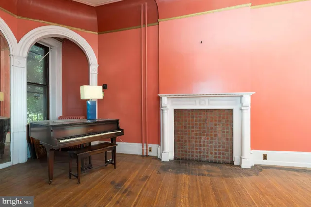 a view of livingroom with furniture and a fireplace