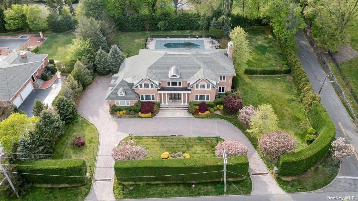 98 Kings Point Road Great Neck, NY 11024 - Photo 1 of 1 an aerial view of a house