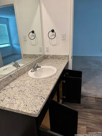 a bathroom with a tub and a shower