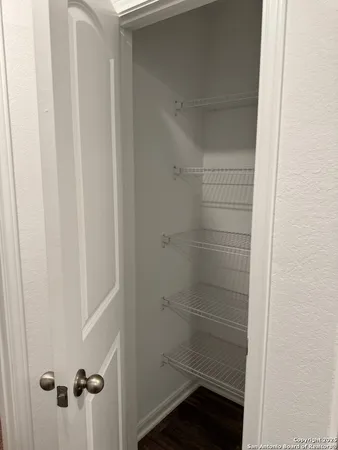 a bathroom with a glass door shower