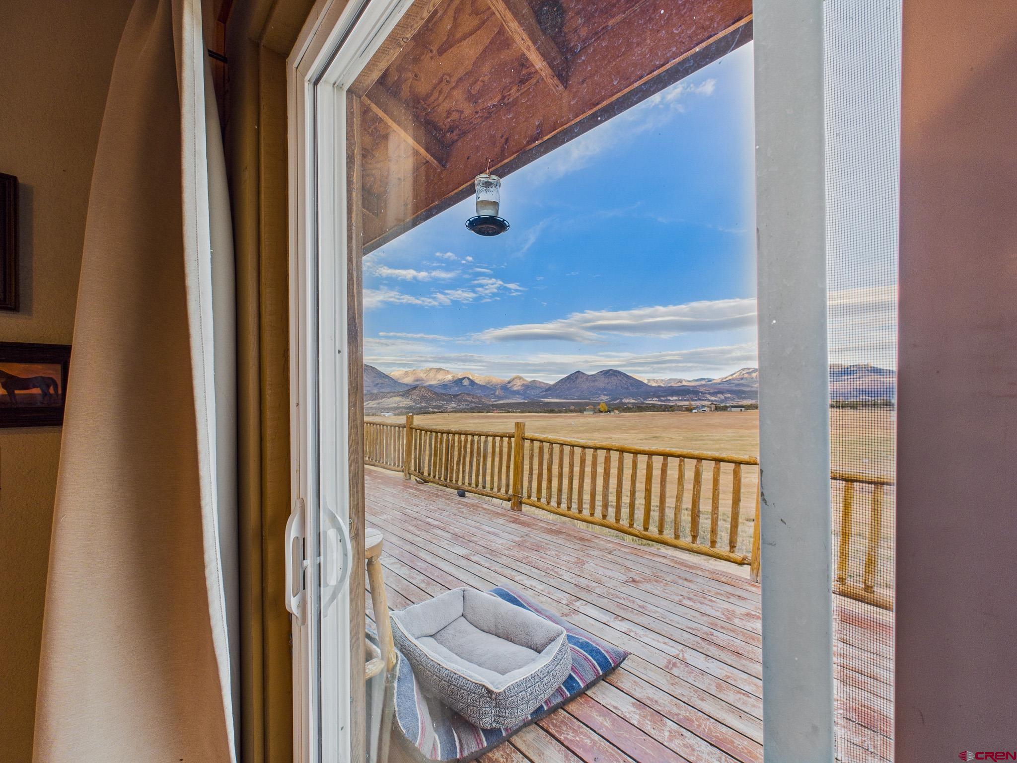 37569 Fruitland Mesa Road Crawford, CO 81415 - Photo 23 of 34 a view of a balcony with wooden floor