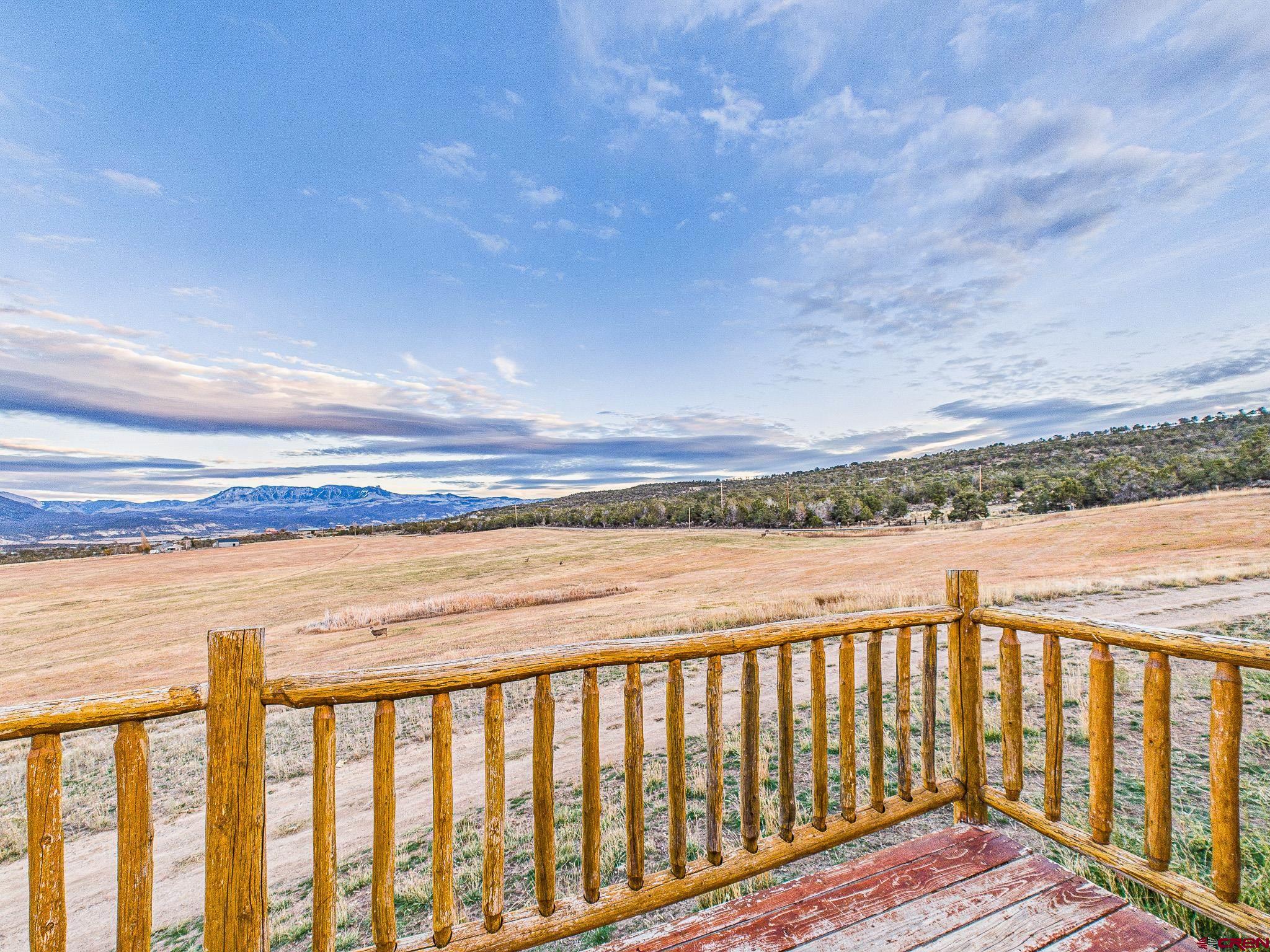 37569 Fruitland Mesa Road Crawford, CO 81415 - Photo 32 of 34 a view of wooden balcony with outdoor space
