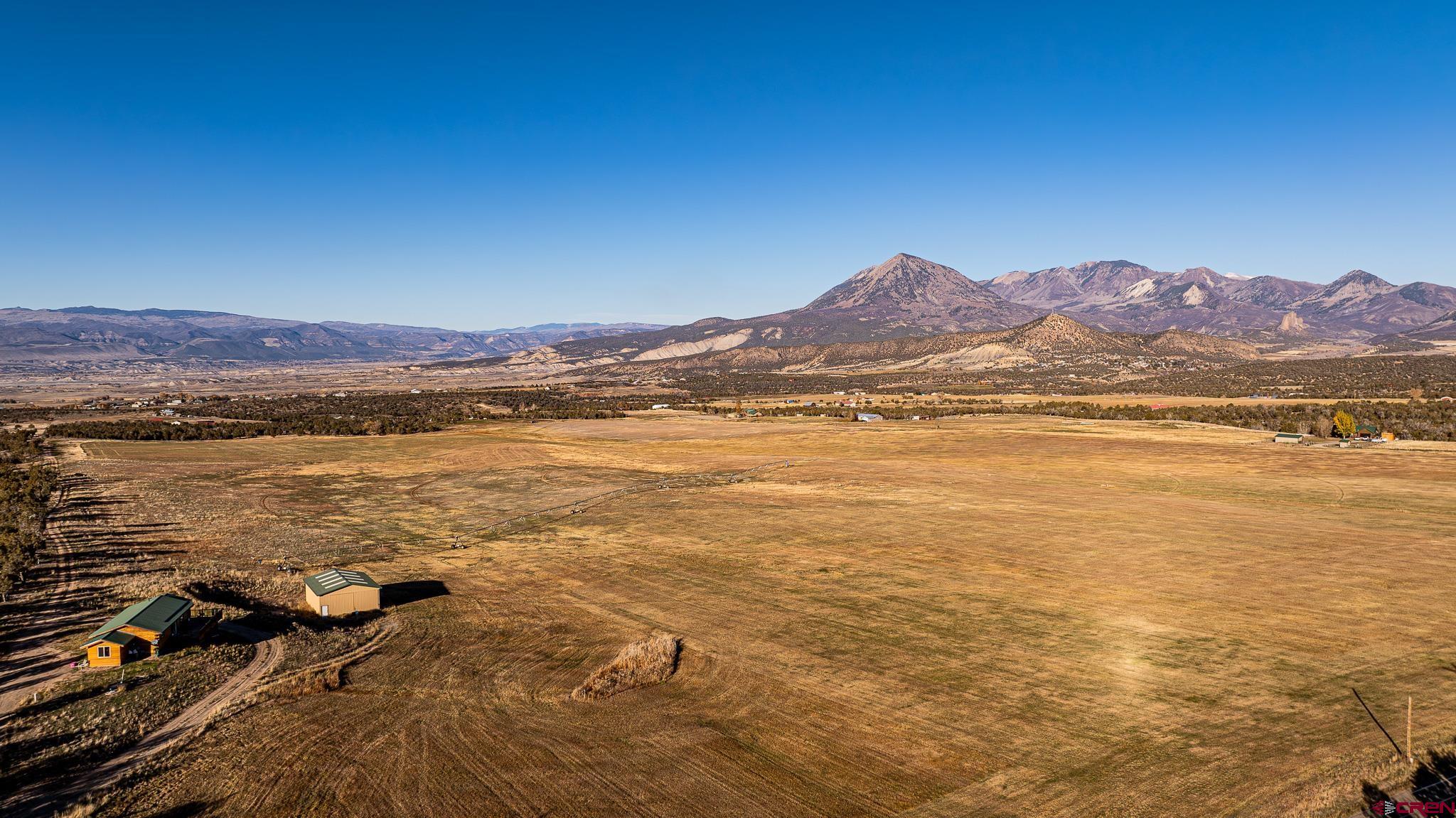 37569 Fruitland Mesa Road Crawford, CO 81415 - Photo 7 of 34 a view of an ocean and a mountain