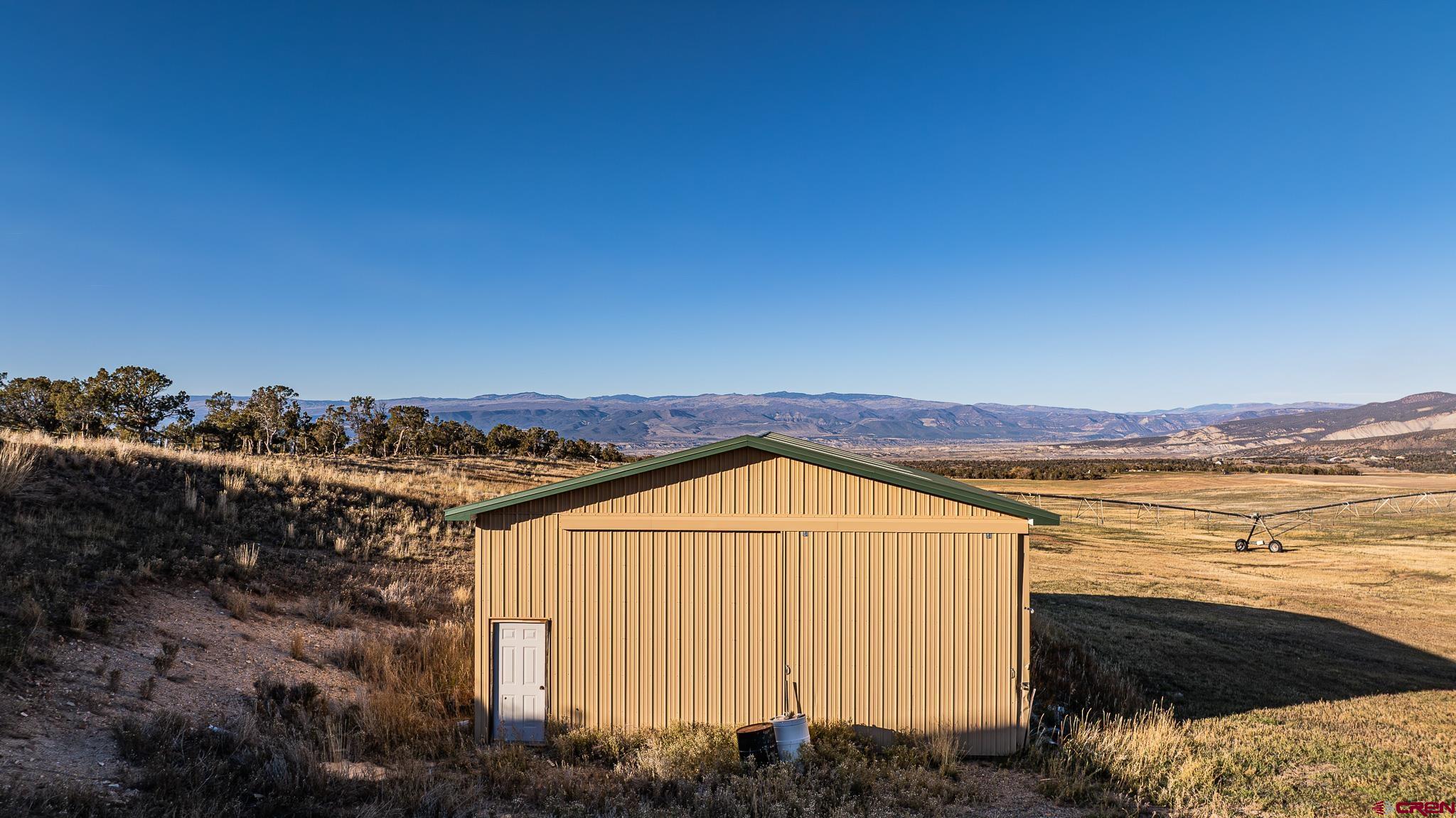 37569 Fruitland Mesa Road Crawford, CO 81415 - Photo 9 of 34 a view of a sky from a terrace