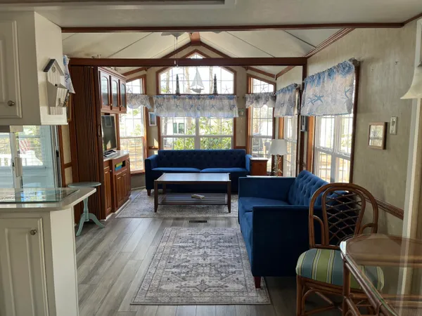 a view of a balcony with a tree