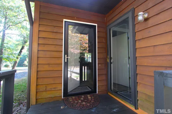 a view of entryway door front of a house