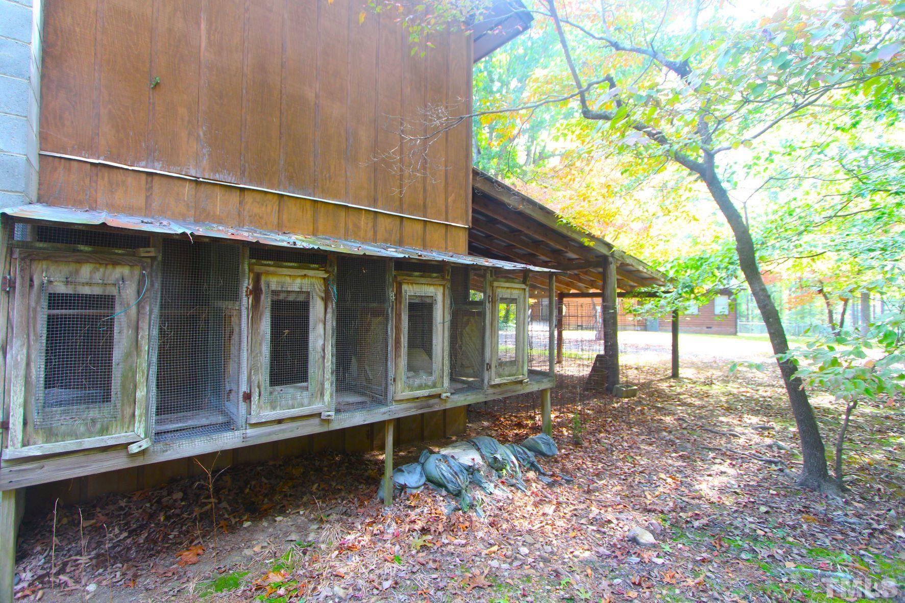 4161 Range Road Stem, NC 27581 - Photo 32 of 43 a front view of a house with a porch