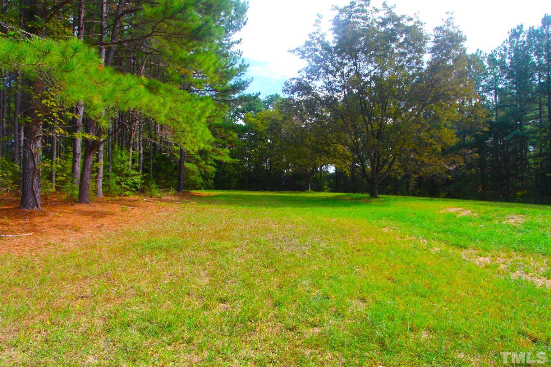 4161 Range Road Stem, NC 27581 - Photo 37 of 43 a view of outdoor space with swimming pool and green space