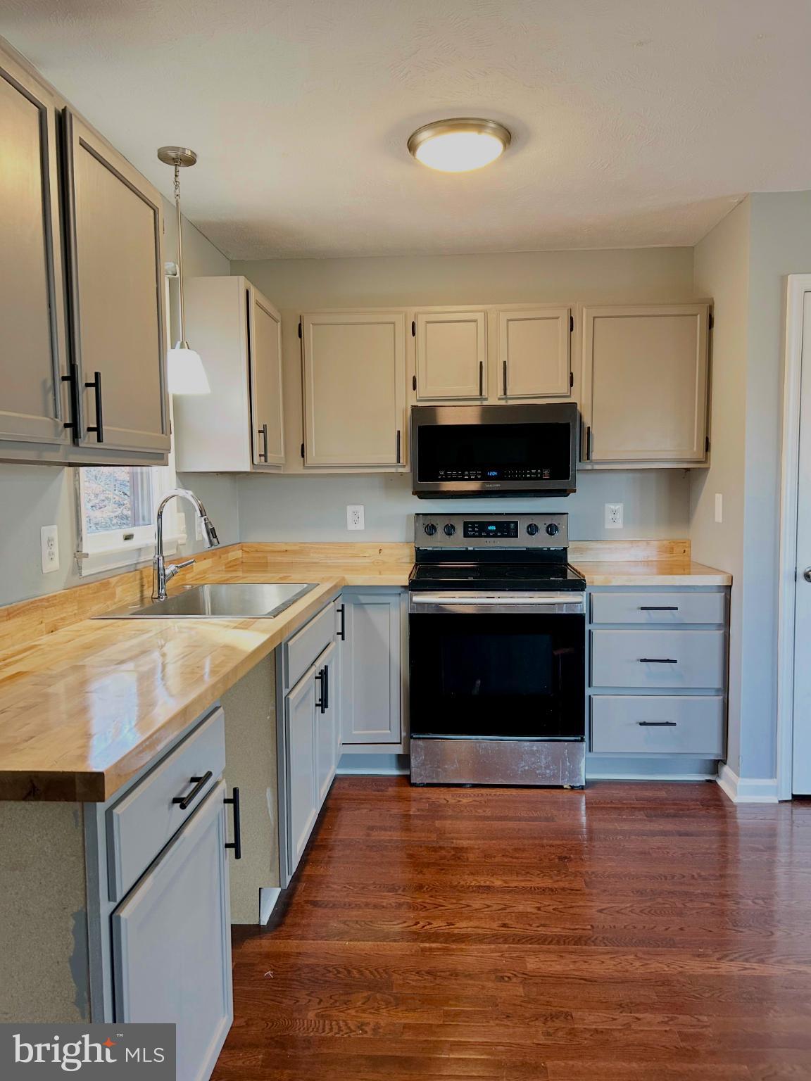 138 Parkside Road Linden, VA 22642 - Photo 16 of 38 a kitchen with a stove and a sink