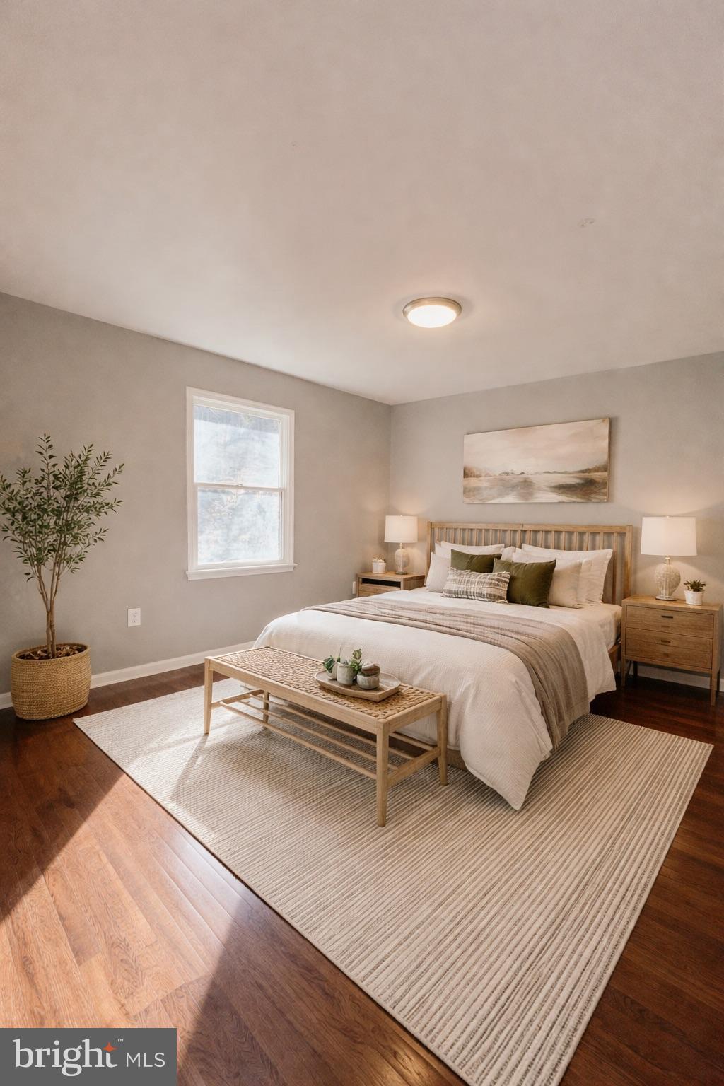 138 Parkside Road Linden, VA 22642 - Photo 20 of 38 a bedroom with a large bed and a chandelier