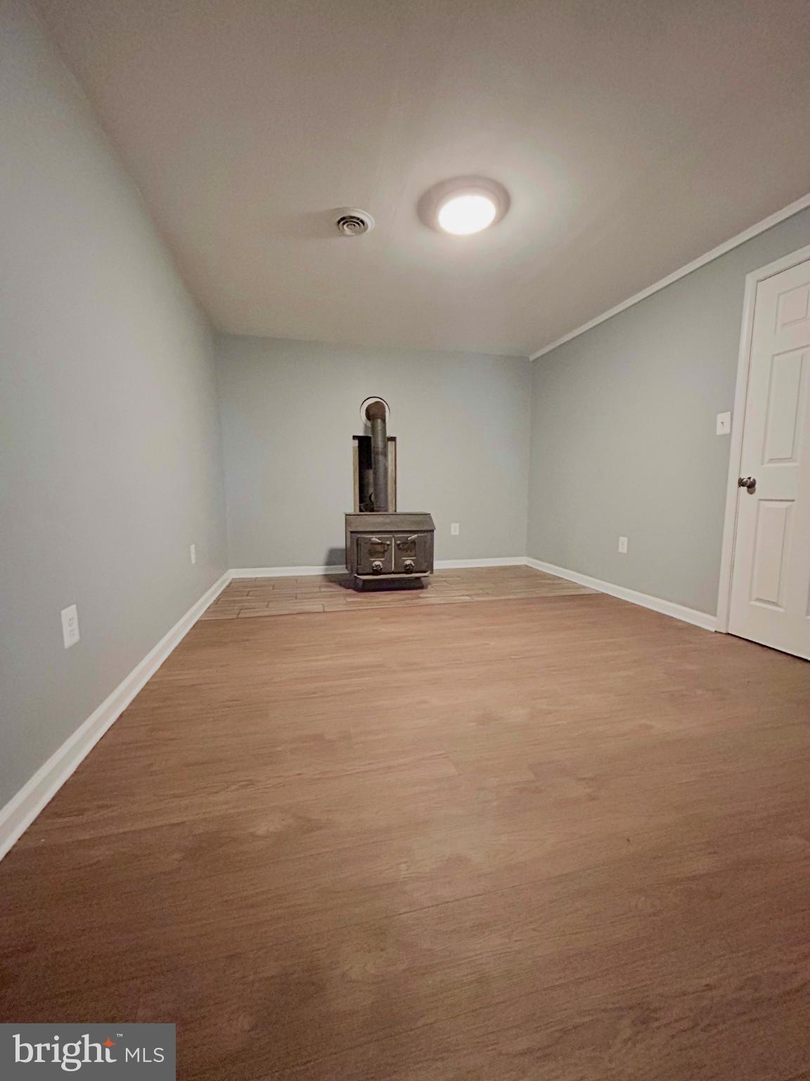 138 Parkside Road Linden, VA 22642 - Photo 9 of 38 a view of empty room with wooden floor