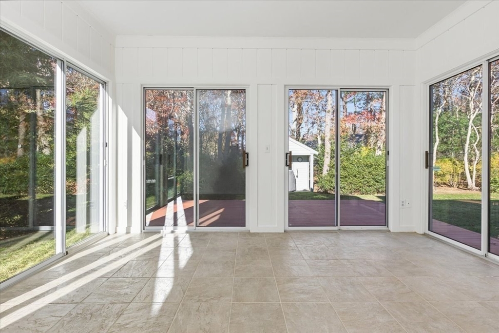 205 James Otis Road Barnstable, MA 02632 - Photo 17 of 41 a living room with furniture and windows