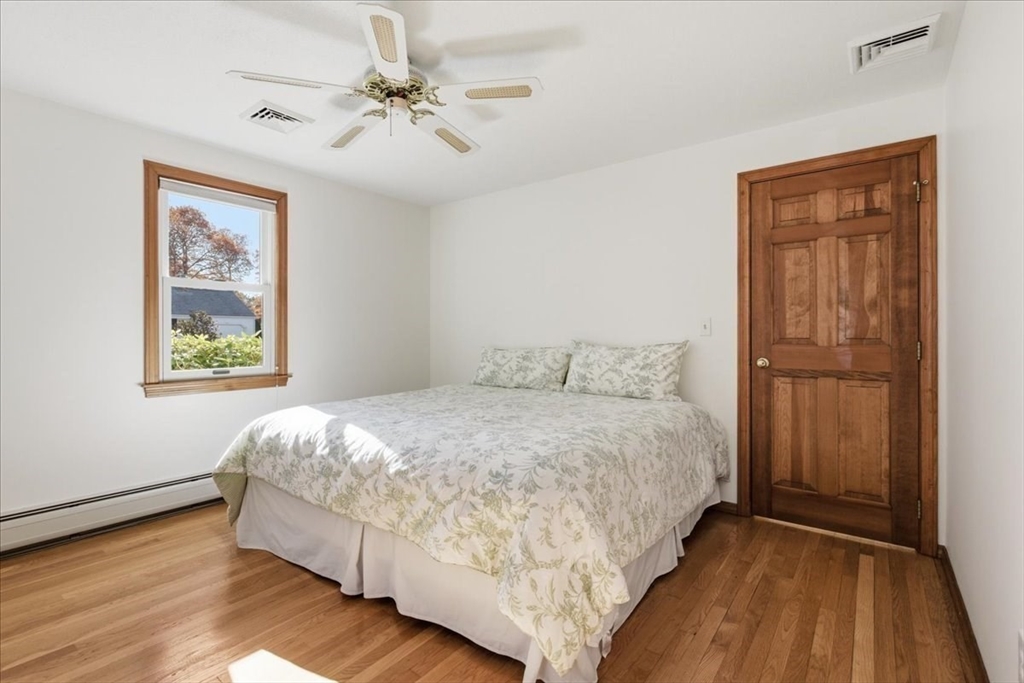 205 James Otis Road Barnstable, MA 02632 - Photo 27 of 41 a bedroom with a bed and a window