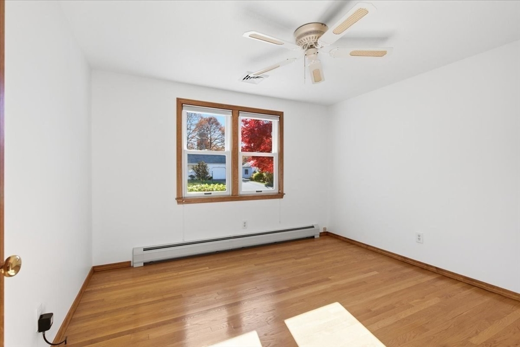 205 James Otis Road Barnstable, MA 02632 - Photo 29 of 41 an empty room with windows and fan