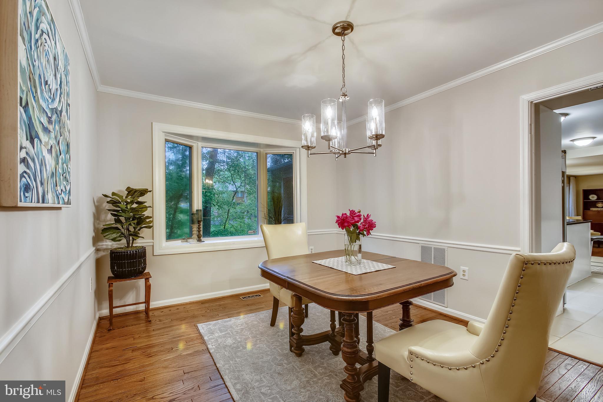 2219 Wakerobin Lane Reston, VA 20191 - Photo 7 of 33 Separate Dining Room with Bay Window