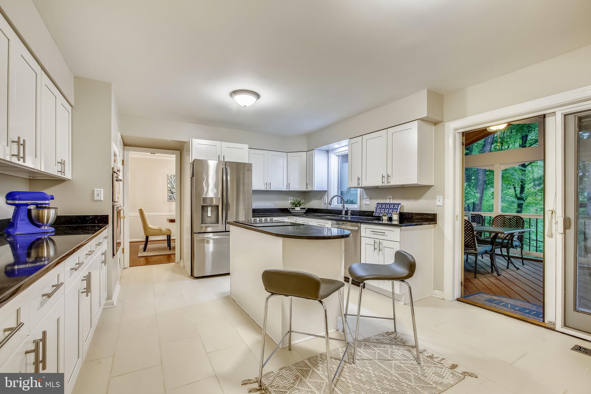 2219 Wakerobin Lane Reston, VA 20191 - Photo 9 of 33 Renovated Kitchen with Access to Screened Porch
