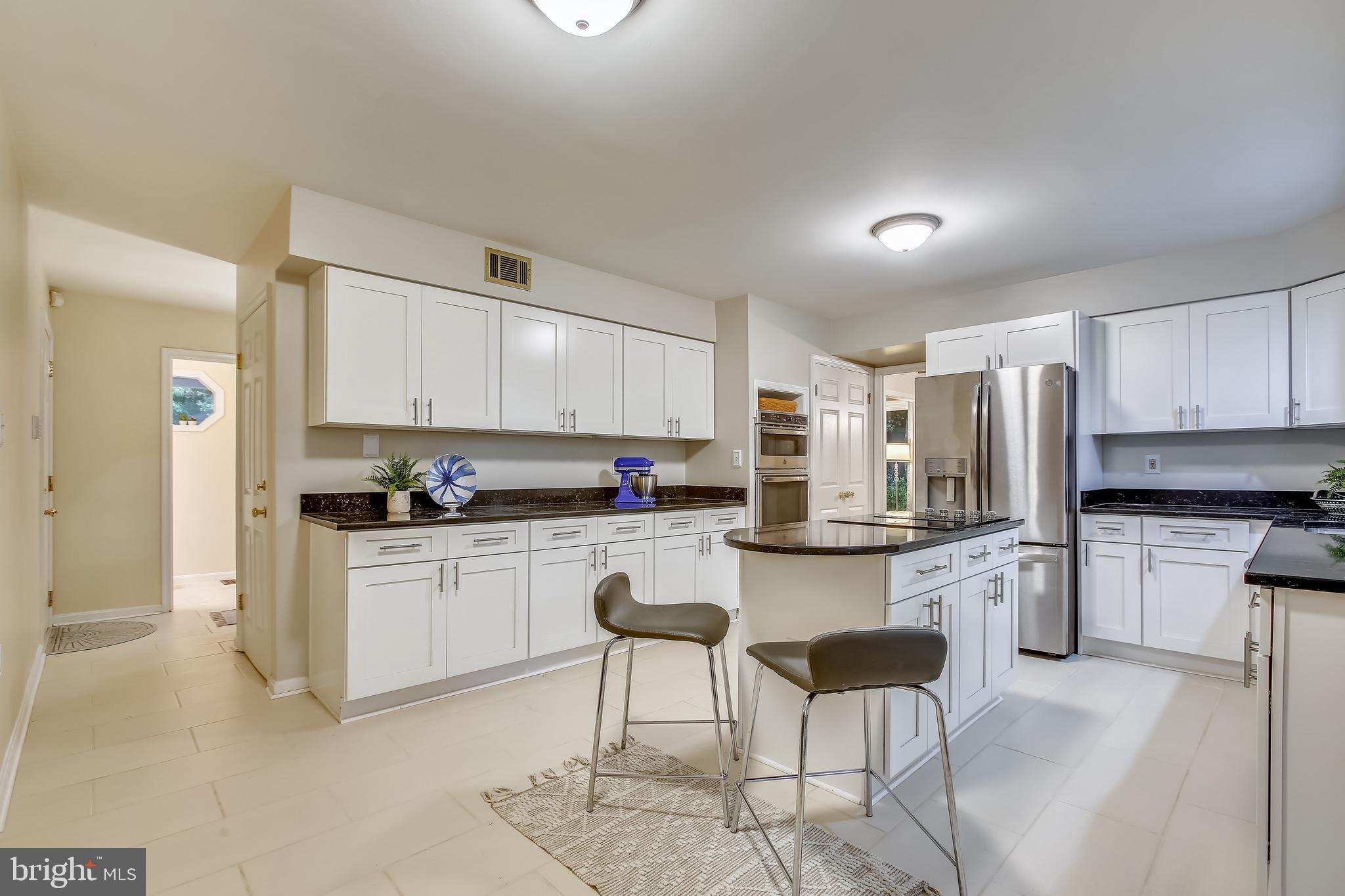 2219 Wakerobin Lane Reston, VA 20191 - Photo 10 of 33 Kitchen with Island and Plenty of Storage