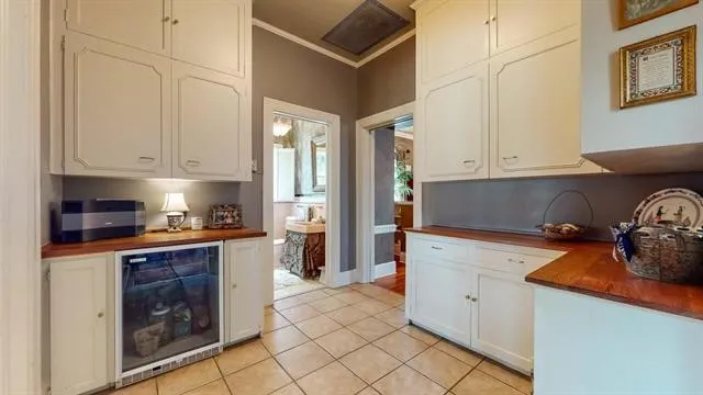 a kitchen with stainless steel appliances granite countertop a stove and a refrigerator