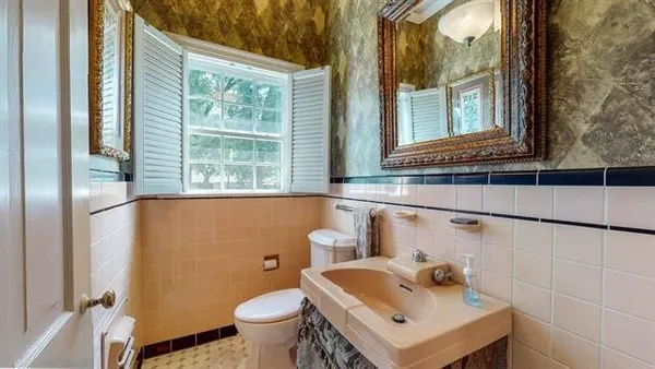 a bathroom with a sink and a toilet