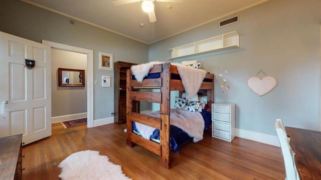 5975 Calder Avenue Beaumont, TX 77706 - Photo 24 of 35 a bed room with furniture and a window