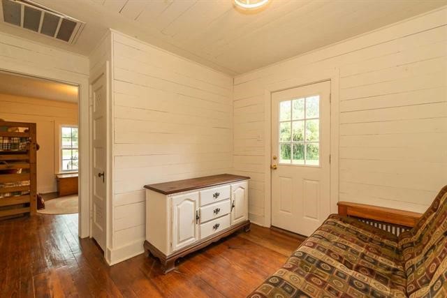 5975 Calder Avenue Beaumont, TX 77706 - Photo 34 of 35 a view of a livingroom with wooden floor and a workspace