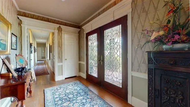 a view of an entryway with a livingroom
