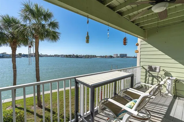 a view of a balcony with lake view