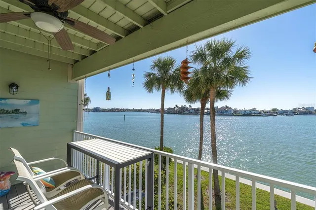 a balcony view with a potted plant