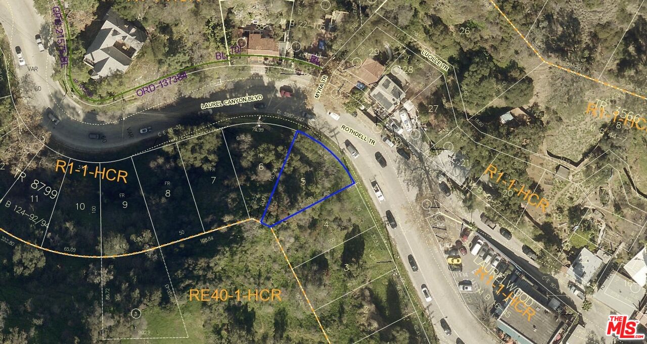 2125 Laurel Canyon Boulevard Los Angeles, CA 90046 - Photo 3 of 8 a picture of water with a tree