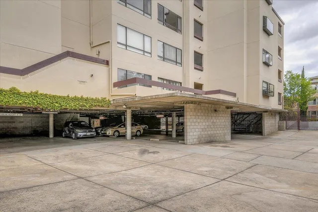 a view of a building with sitting area