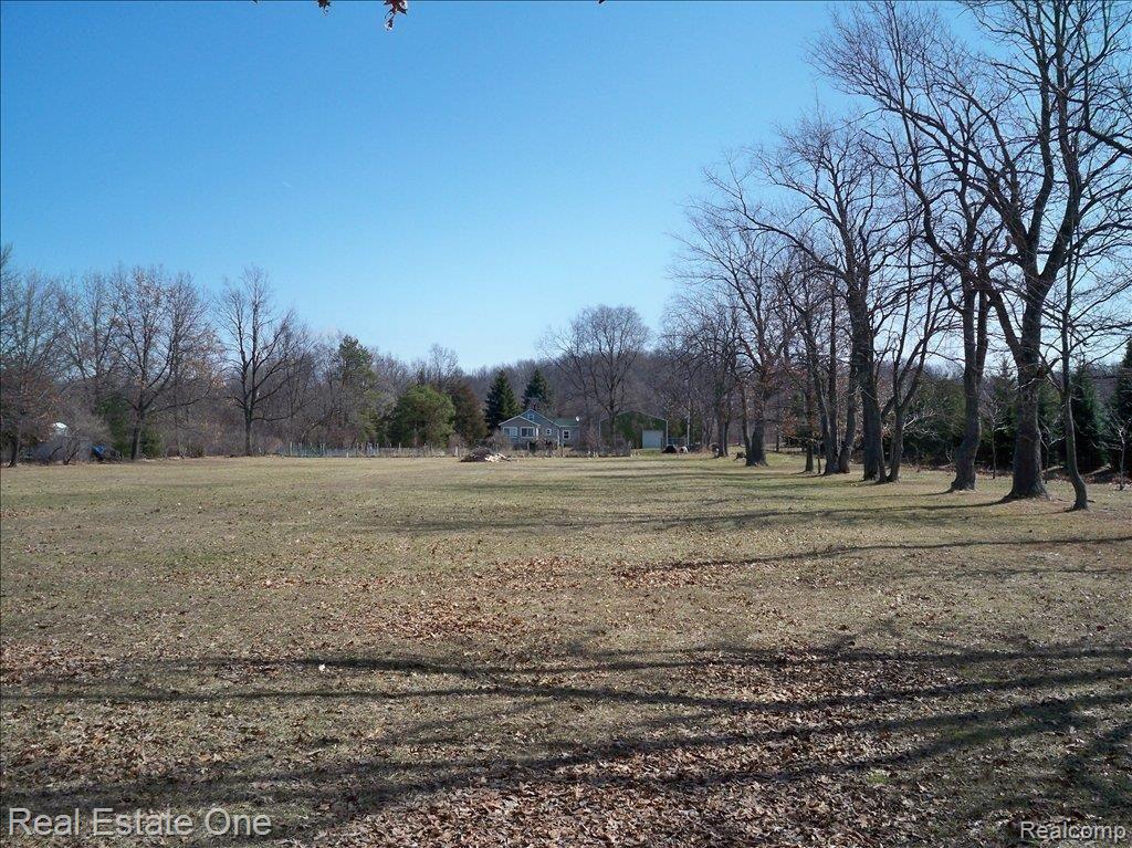 8671 Sashabaw Road Clarkston, MI 48348 - Photo 17 of 20 BACK OF HOUSE