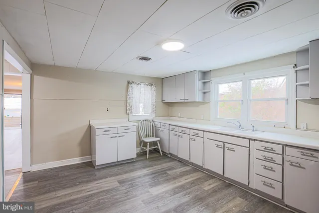 a view of a back yard from a room