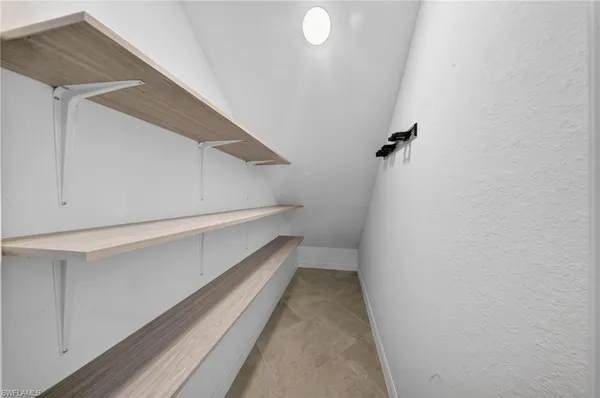 a view of a room with rack on the wall