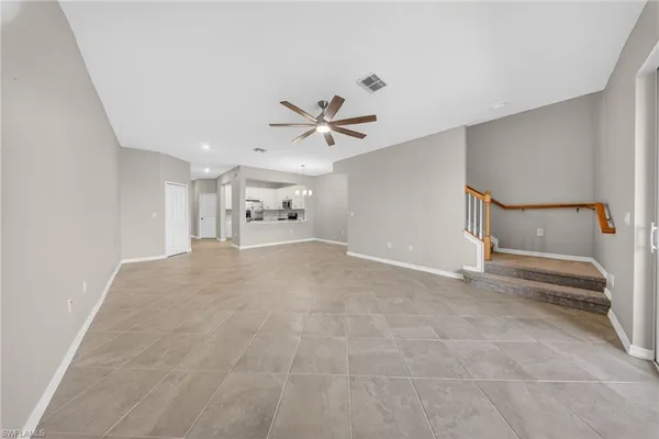 a view of a livingroom with a ceiling fan