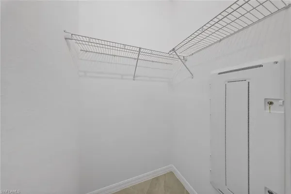 a view of a room with racks on the wall