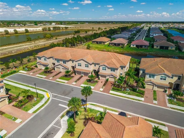 an aerial view of a house with a swimming pool