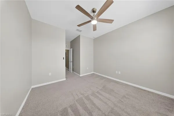 a view of an empty walk in closet