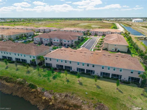 an aerial view of a house with swimming pool