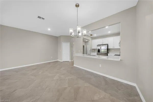 a view of a kitchen and a sink