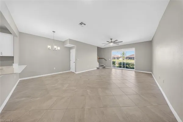 a view of a livingroom and a window